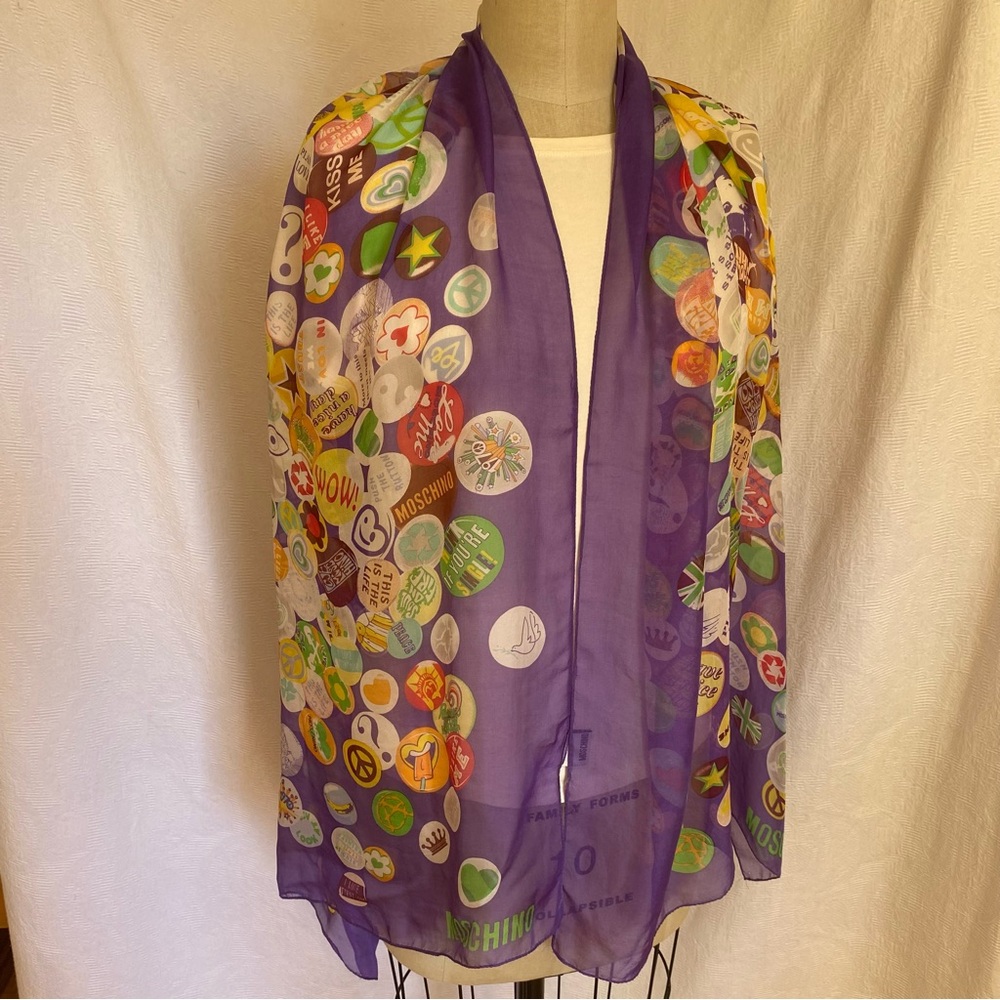 Moschino silk scarf with multiple buttons print.